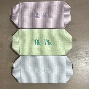 Embroidered Phi Mu seersucker cosmetic bag
